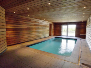Comfortable chalet with indoor pool hammam and sauna near Stoumont